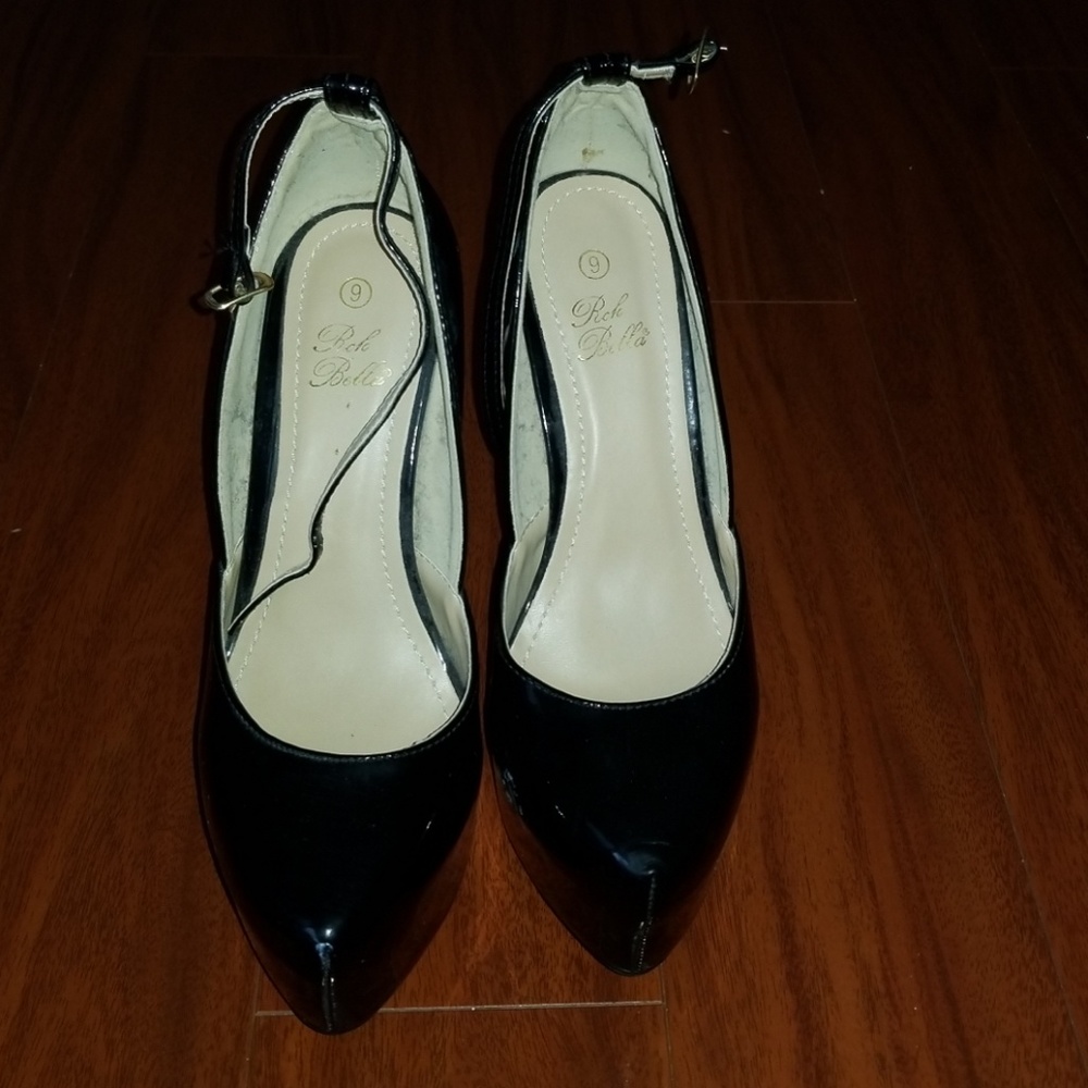 Black platform pumps